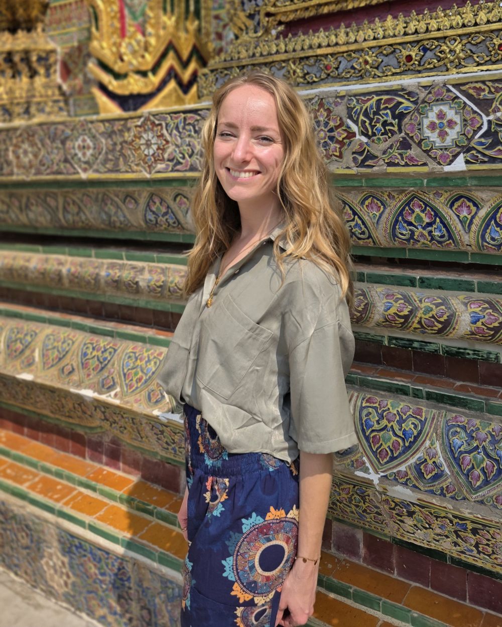 Sophia Müller, product designer, at a temple in Bangkok